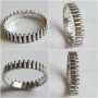 silver ring bandolier / machine-gun belt